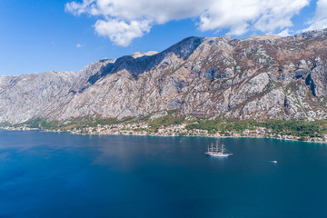 Aerial view of the big white Sailing Ship in the Bokaktorsky Bay. Montenegro.