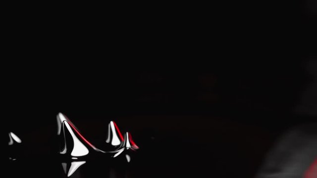 Ferrofluid. Black liquid surface. Abstract background.
