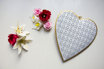 Fototapeta premium Colorful flowers with sugar and big heart