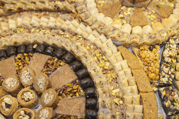 Selction of sweet oriental petit fours dessert at a restaurant buffet