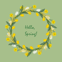 Floral round frame from spring flowers. Yellow and white flowers of tulips, daffodils and mimosa on a green background. There is text 