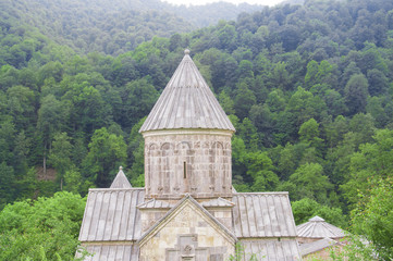 Fototapeta na wymiar Haghartsin is an Armenian monastery located in the Tavush region of Armenia. Scenic view of the in the wooded valley of the Ijevan mountain range.