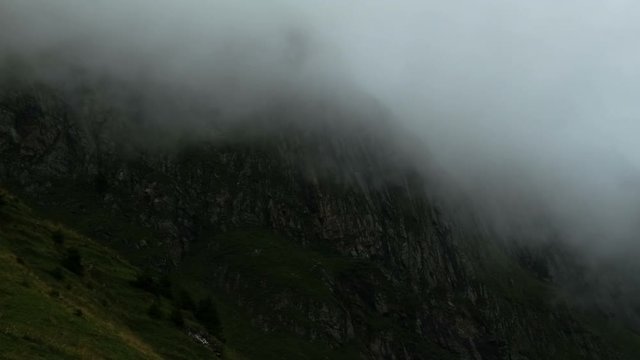 Time lapse clouds float in the valley under the iconic swiss mountain Eiger near Grindelwald village Bern region Switzerland Alps travel Europe wanderlust