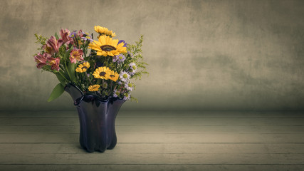 Floral arrangement and vase isolated on background