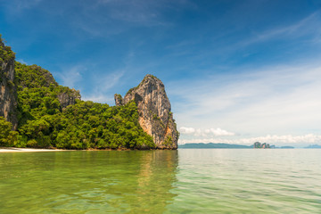 Fototapeta na wymiar horizontal sea-going - Andaman Sea and rocky coast on an island in Thailand