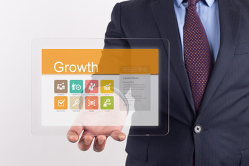 Hand Holding Transparent Tablet PC with Growth screen