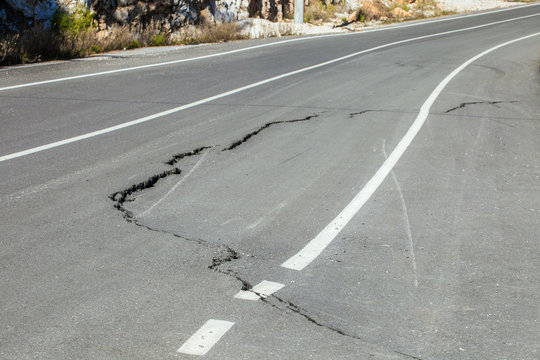 New asphalt road with a big crack