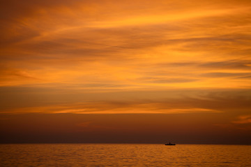 Naklejka na ściany i meble Amazing sunset over the sea