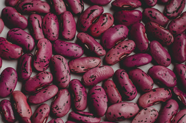 Many speckled purple kidney beans textured background