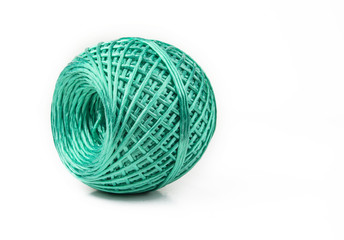 Artificial ball of nylon string for household on white.