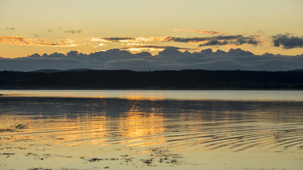 Sunrise Over a Calm Lake