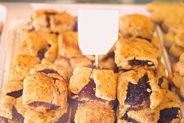 Closeup biscuits with jam. With a white sign for text