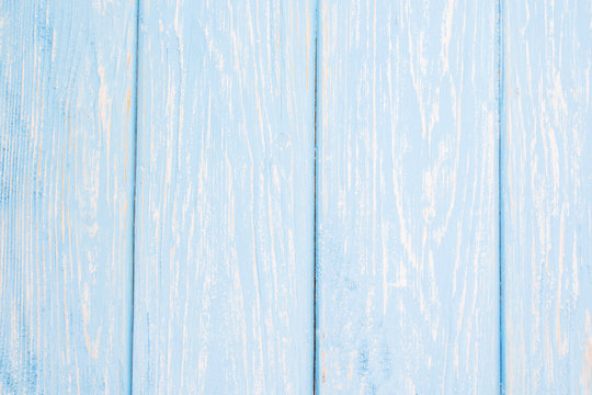 light blue wood texture background.