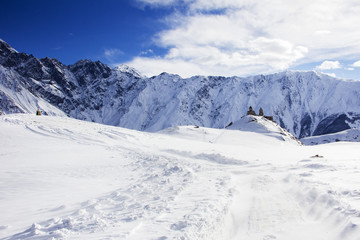 Fototapeta na wymiar Winter snowy landscape in the Caucasus Mountains Georgia.