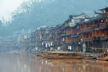 Fenghuang, China - January 10, 2015 : Boats on the Tuojiang River, Fenghuang ancient town, China