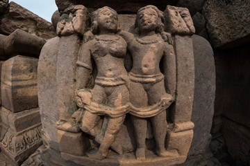 Sanchi Stupa, ancient buddhist hindu statue details, religion mystery, carved stone. Travel destination in Madhya Pradesh, India.