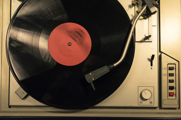 Vintage vinyl player close up top view. Vinyl record
