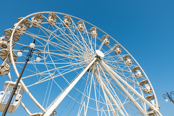 Ferris wheel with blue sky