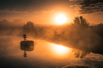 Fototapeta na wymiar Sunrise on river