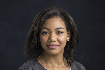 Portrait of a young black woman smiling