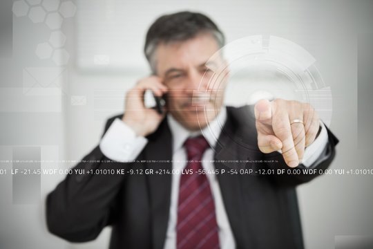 Businessman touching point on touchscreen