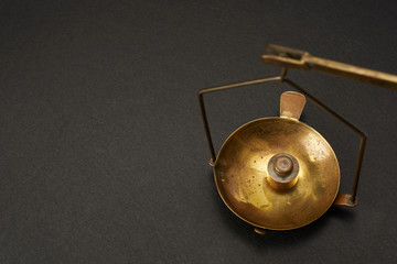 Weight scale with a plummet.