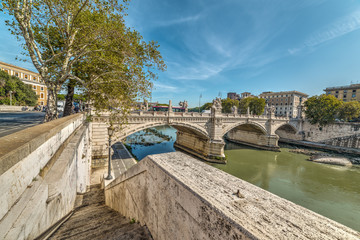 Fototapeta na wymiar Bridge over Tiber river in Rome