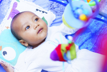 Happy Baby Boy Playing With Baby Play Gym