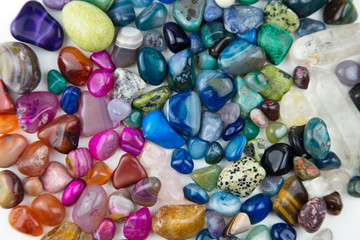 various tumbled bright coloured semi precious gemstones