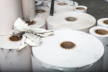 Big rolls with white paper ready to print.