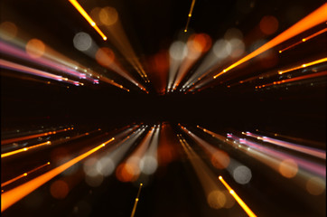 Abstract lens flare. concept image of space or time travel background over dark colors and bright...
