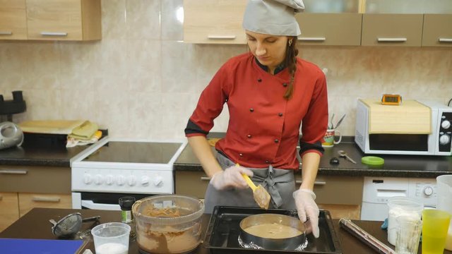 The pastry chef skillfully performs holiday order.