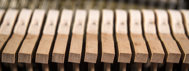 Inside an old piano - hammers and strings