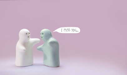 filling love of couple ceramic doll on pink background 