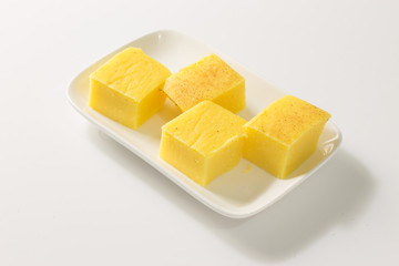 Canjica ou curau Brazilian Tradicional Food  made from corn (canjica ou curau  no fundo branco)