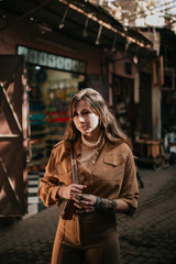 Young female tourist in a Muslim neighborhood