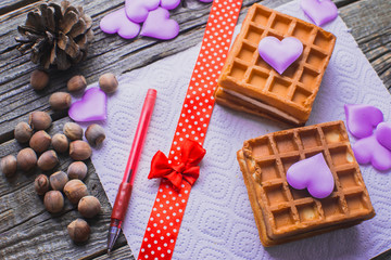 Homemade waffles on a wooden background hearts, purple, Valentine's day