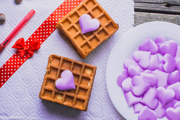 Homemade waffles on a wooden background hearts, purple, Valentine's day