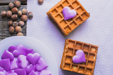 Homemade waffles on a wooden background hearts, purple, Valentine's day