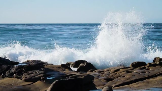 Waves crashing on rocks at La Jolla beach