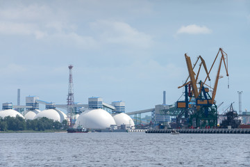 View on the port taps in the river port of Daugava, in Riga. The chemical substances transfer...