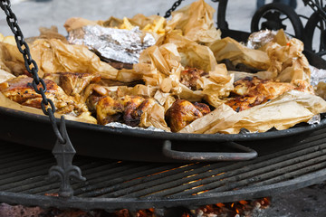 Big barbecue grill of meat. Roasted ribs, chicken, pork, turkey, roast potatoes .