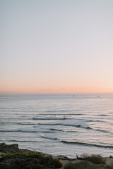 Fototapeta premium Sunset over cliffs and ocrean