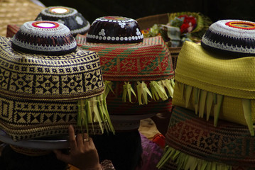 Balinese Hindu Offerings. At Hindu religious events beautiful and artistic offerings are taken to the temple to be blessed by the priest or holy man.