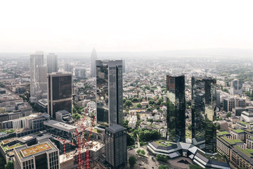 Fototapeta premium Aerial view of modern skyscrapers of Frankfurt city center from the Main Tower, Frankfurt am Main, Germany