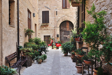 Beautiful Street in the ancient town of Spello in Umbria. Traditional italian medieval historic center in central Italy
