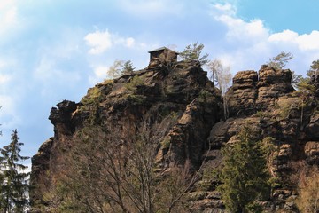 View of the landscape at sunset in National Park Bohemian Switzerland, Rudolfuv kamen lookout cottage, Czech Republic