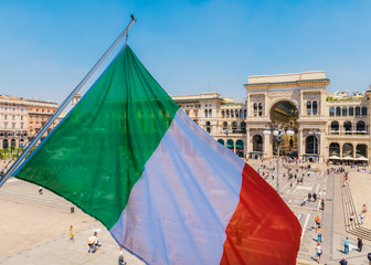Vittorio Emanuele II monument in Milan, Italy with italian flag