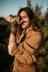 Young woman with a henna tattoo