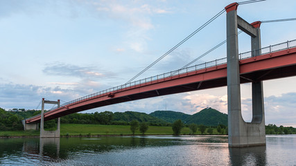 Orange bridge (Jedleseer Steg) across the Neue Donau in Vienna Austria